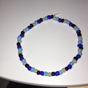 Black, blue and white beaded bracelet